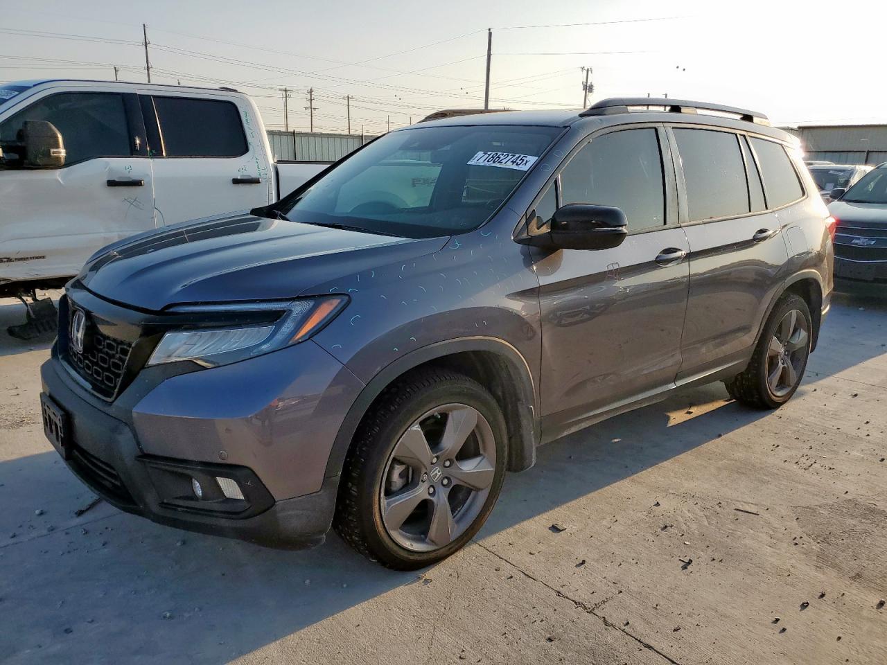 Salvage Honda Passport Image