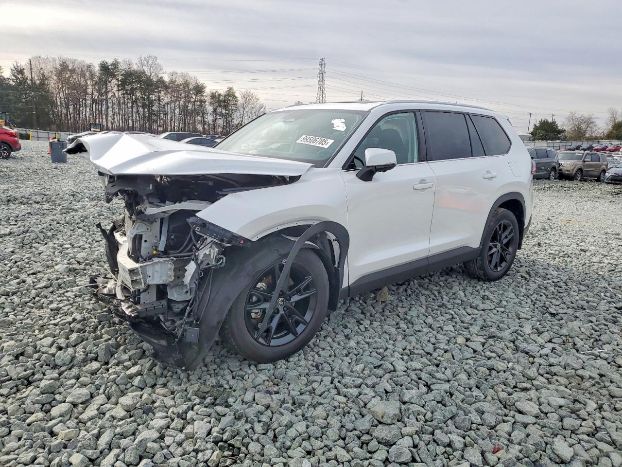 Salvage Toyota Grand High Image