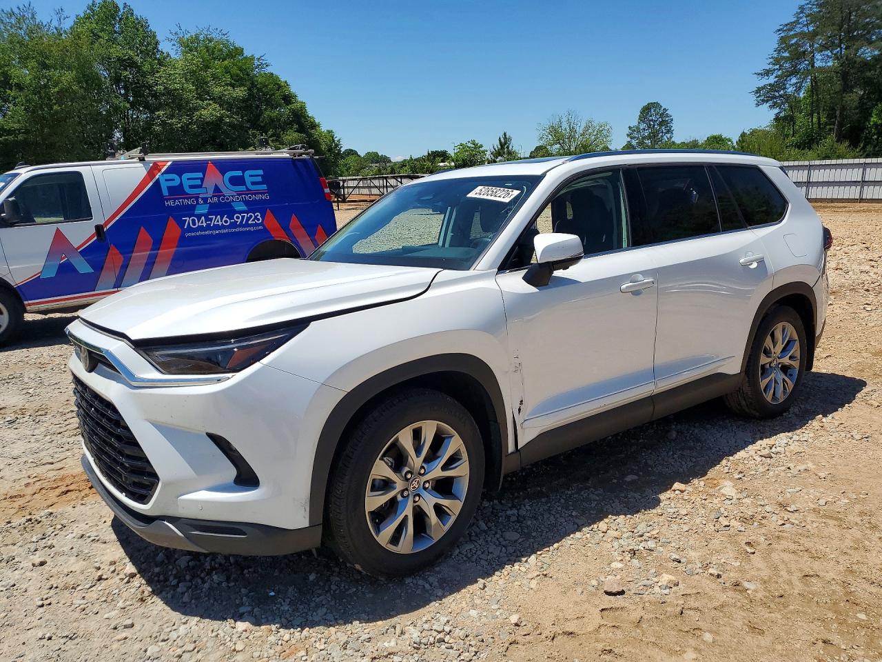Salvage Toyota Grand High Image