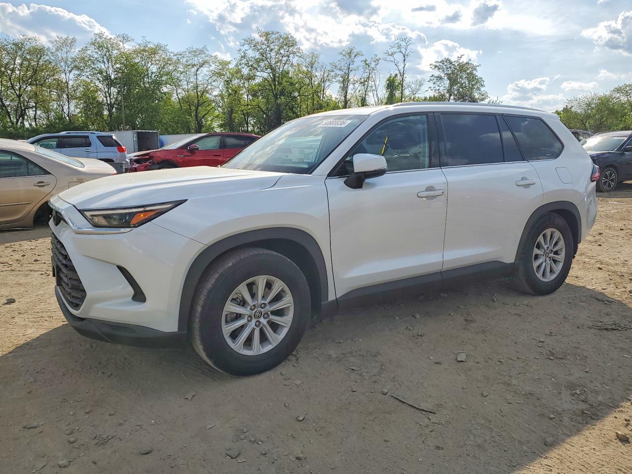 Salvage Toyota Grand High Image