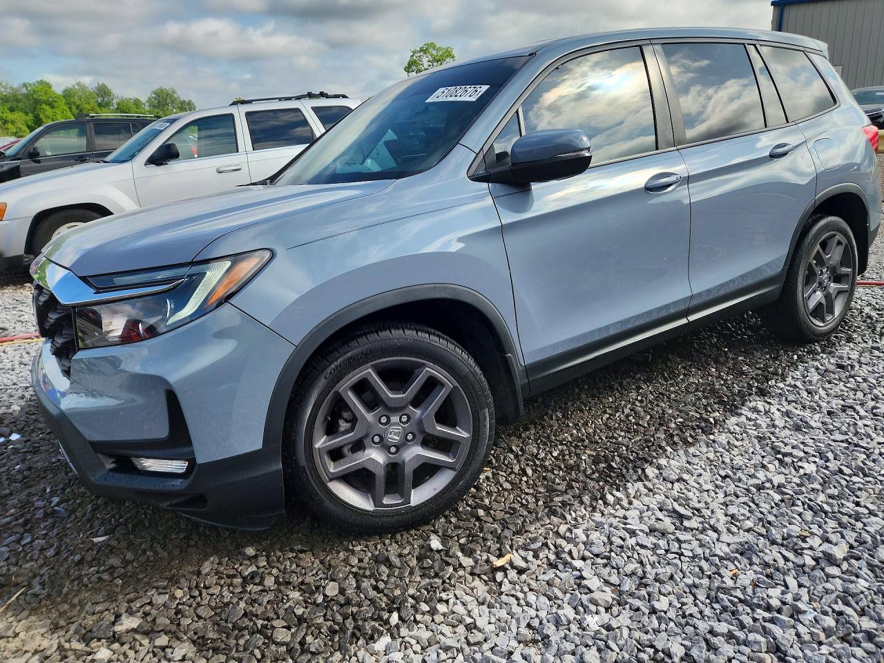 Salvage Honda Passport Image