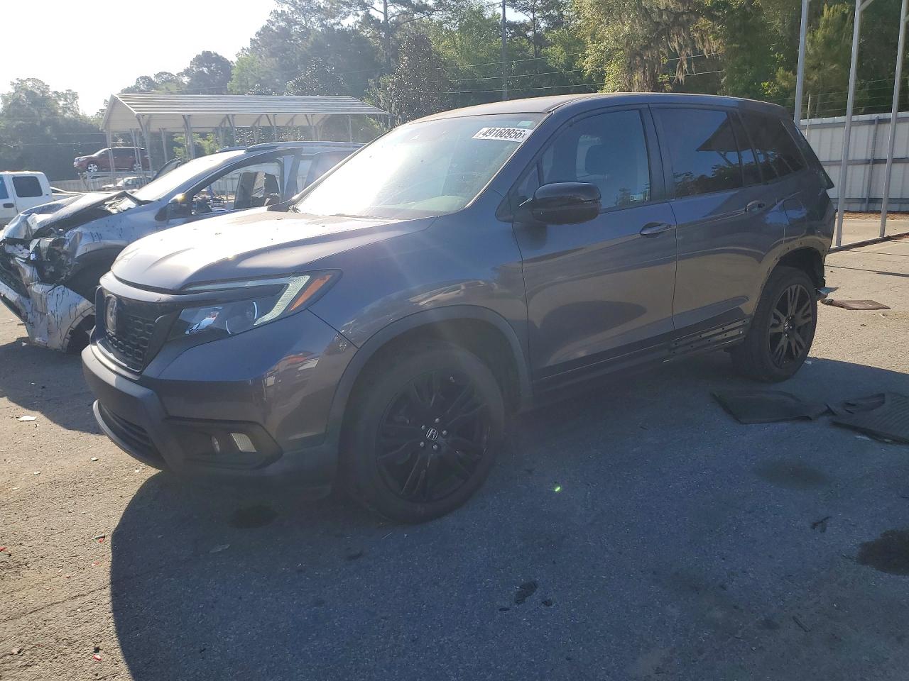 Salvage Honda Passport Image
