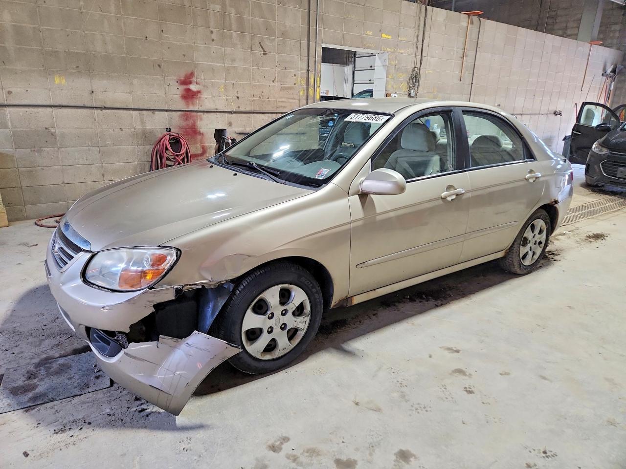 Salvage Kia Spectra Image
