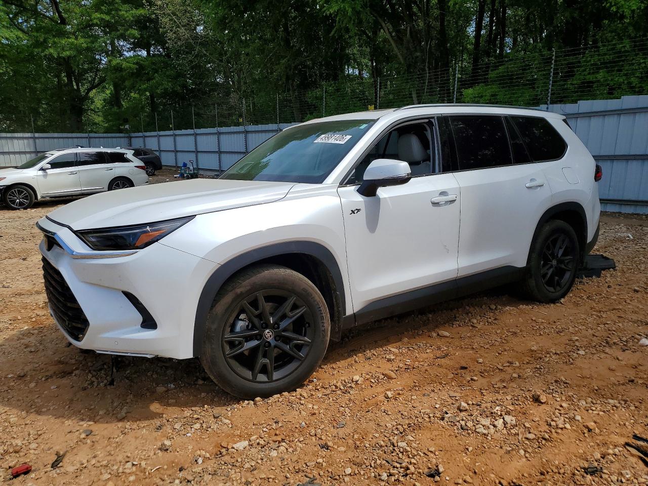 Salvage Toyota Grand High Image