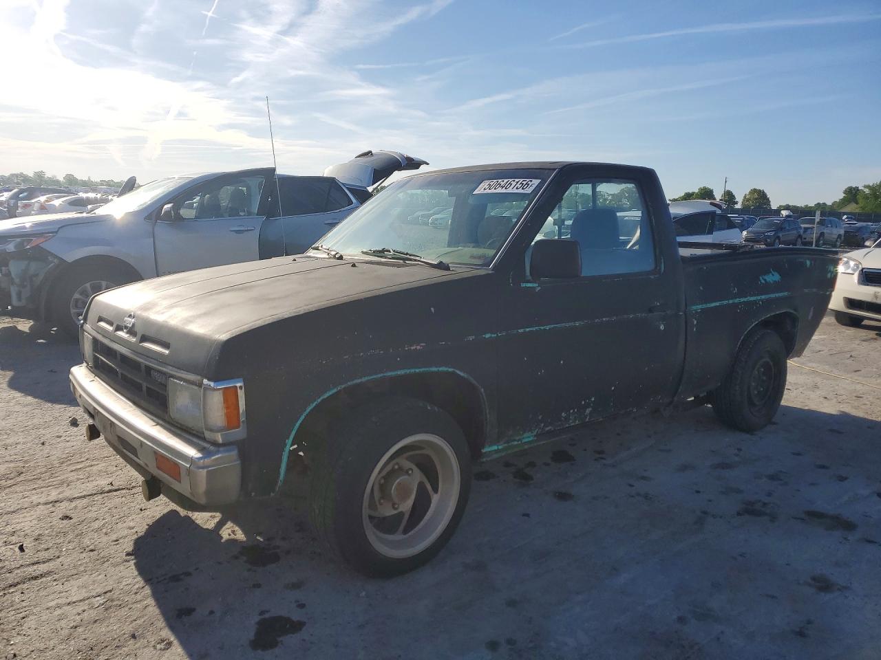 Salvage Nissan D21 Image