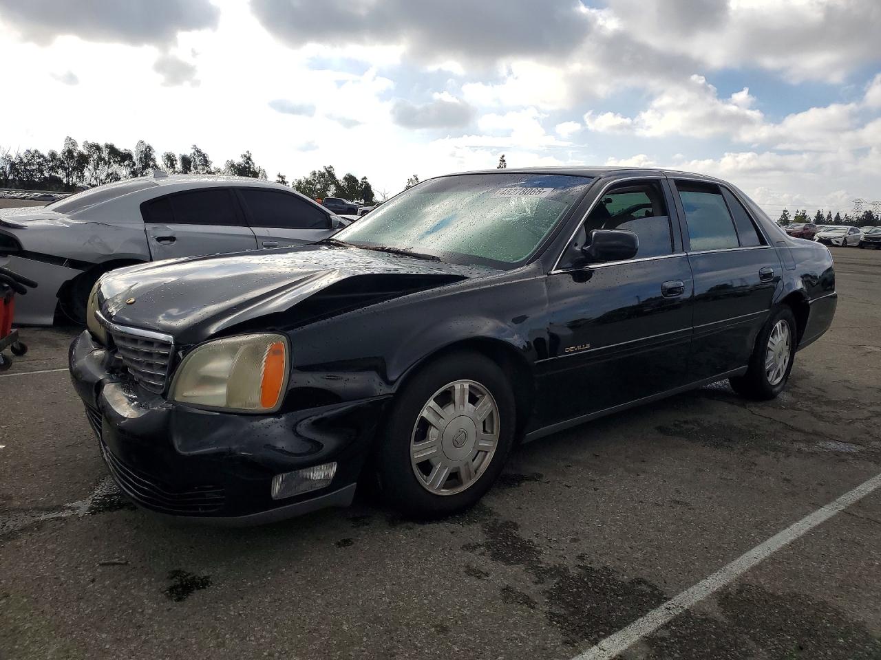 Salvage Cadillac DeVille Image