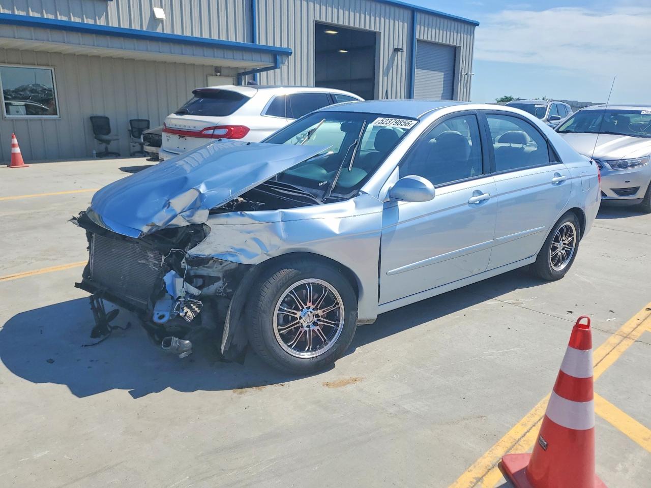 Salvage Kia Spectra Image