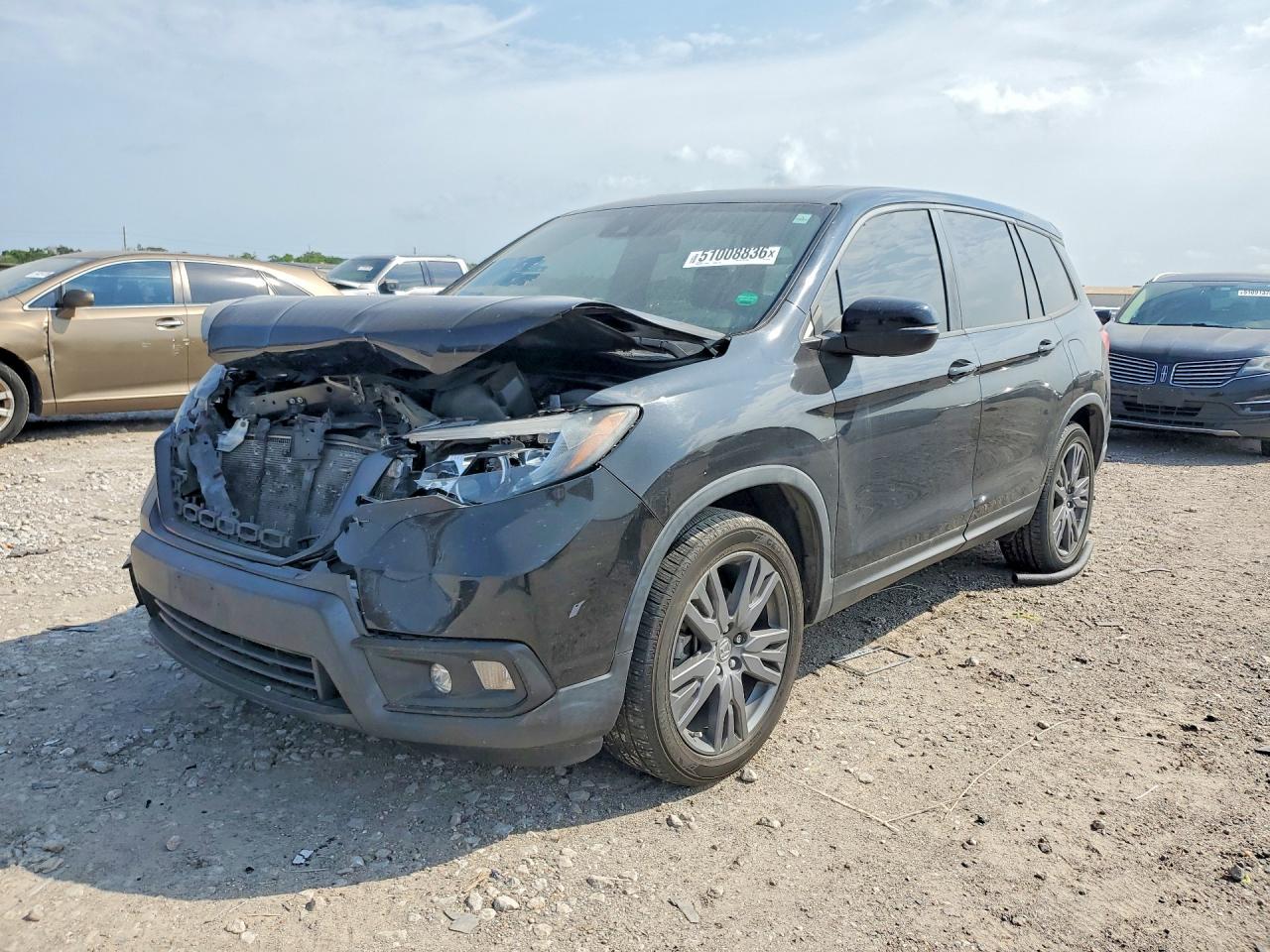 Salvage Honda Passport Image
