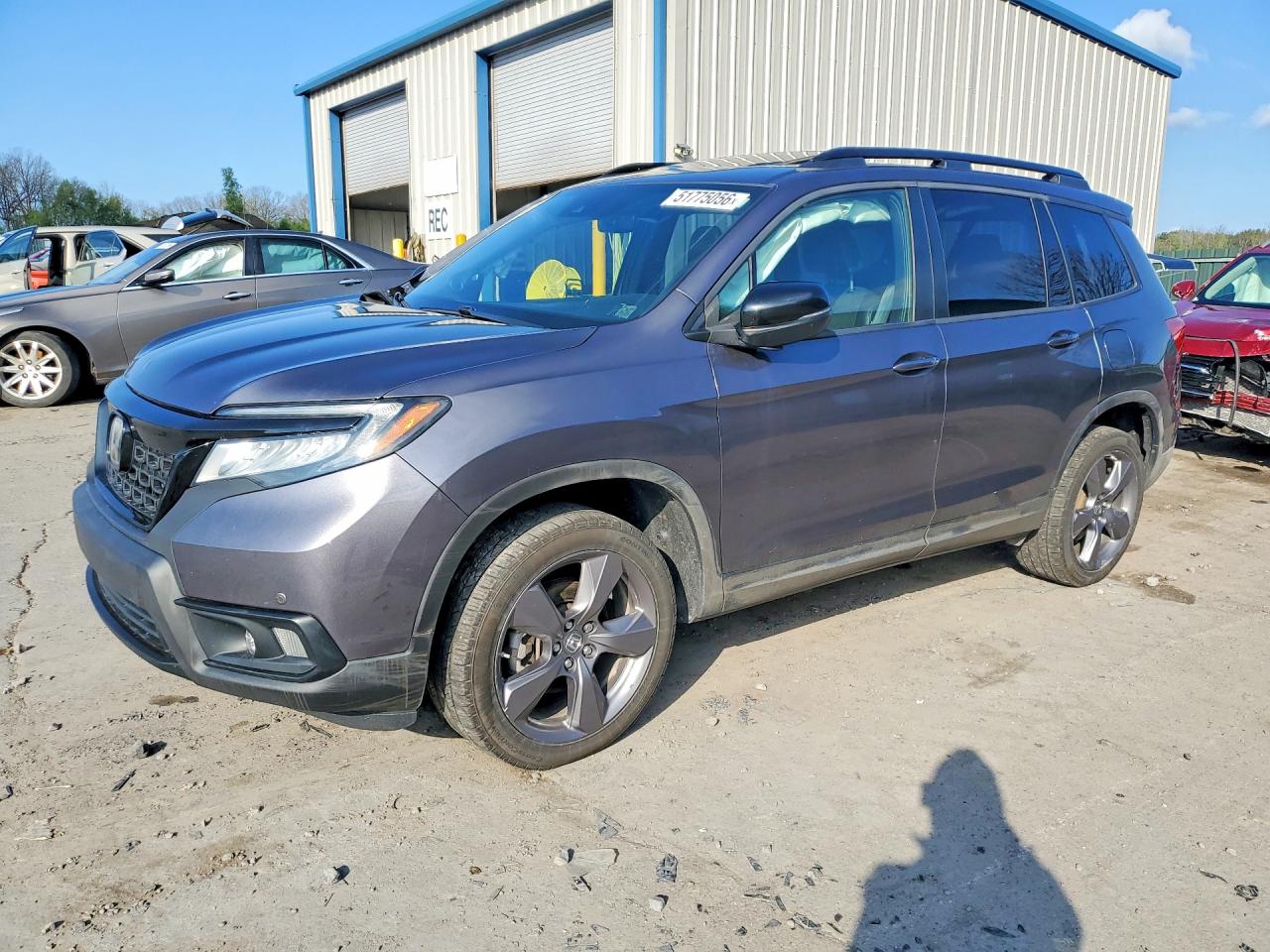 Salvage Honda Passport Image