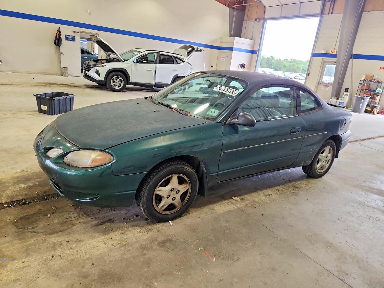 Salvage Ford Escort Image