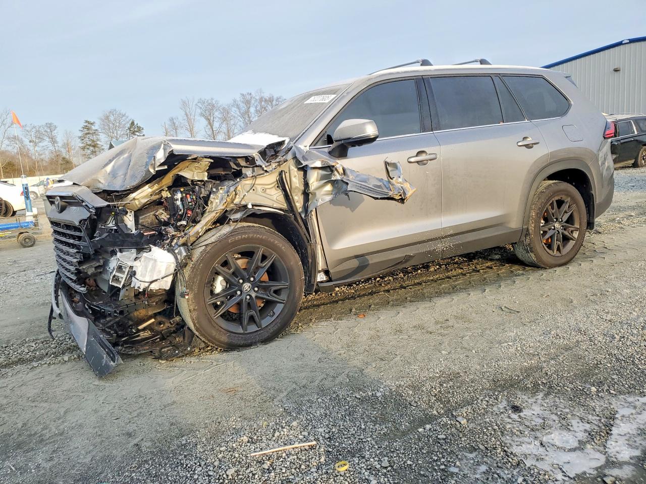 Salvage Toyota Grand High Image