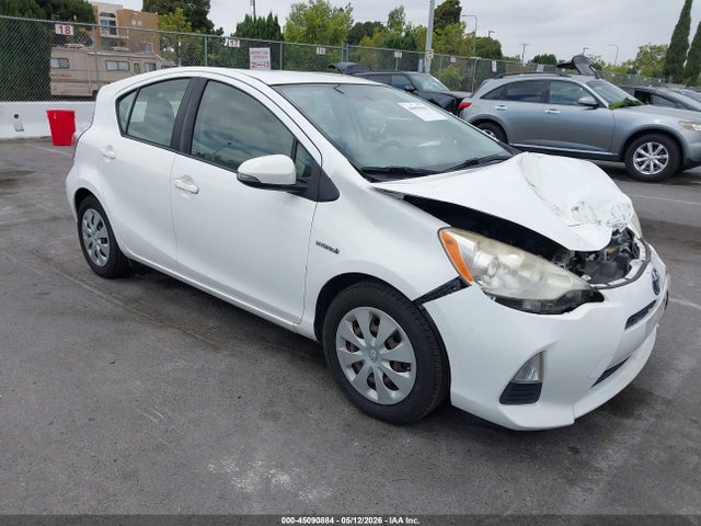 Salvage Toyota Prius c Image