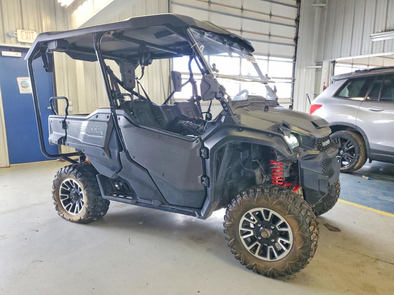 Salvage Honda Pioneer Image