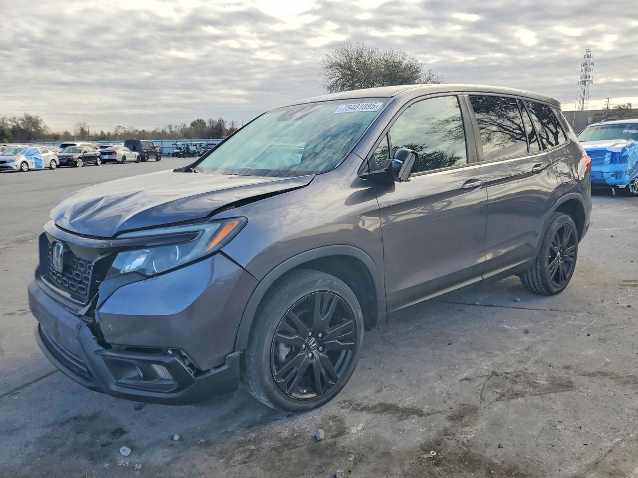 Salvage Honda Passport Image