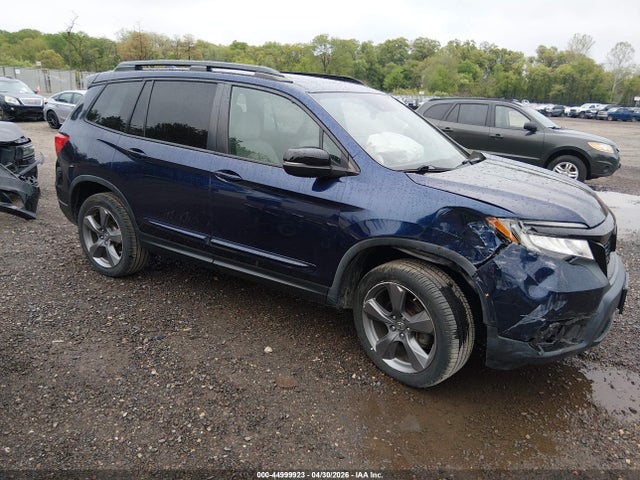Salvage Honda Passport Image