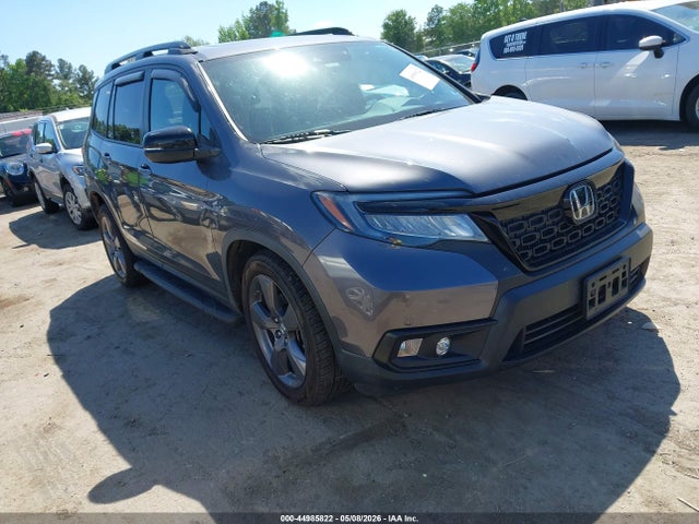 Salvage Honda Passport Image