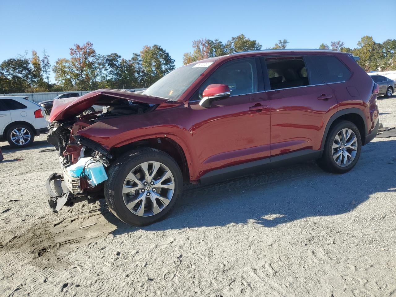 Salvage Toyota Grand High Image