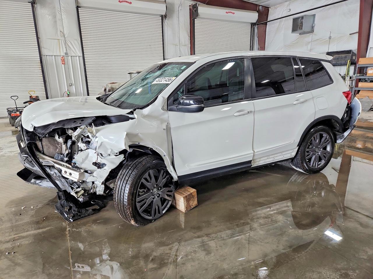 Salvage Honda Passport Image
