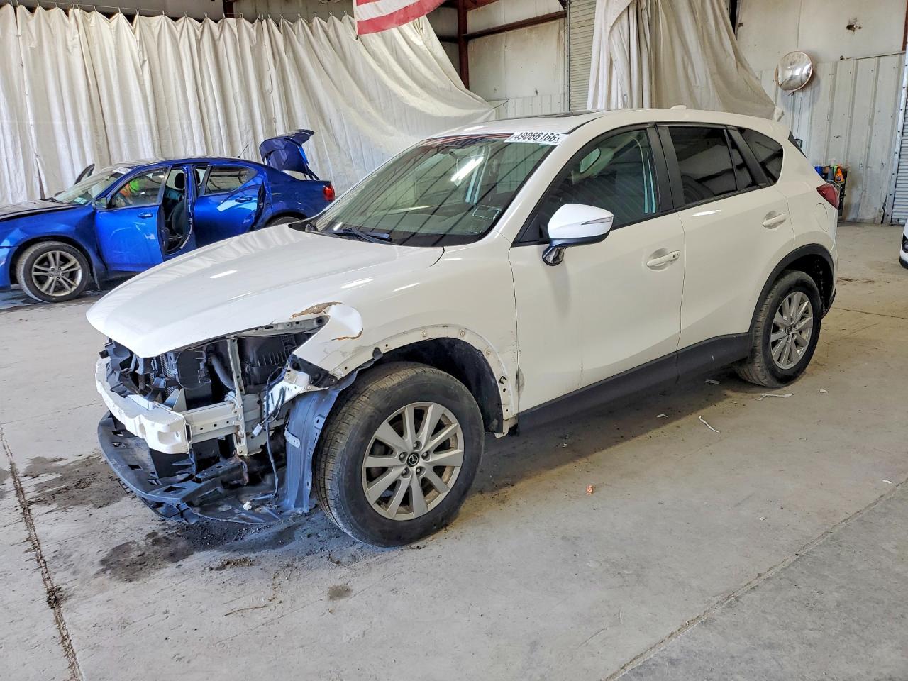 Salvage Mazda Cx Image