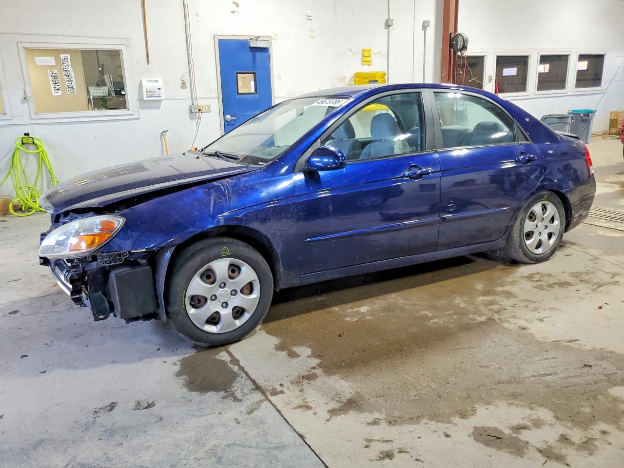 Salvage Kia Spectra Image