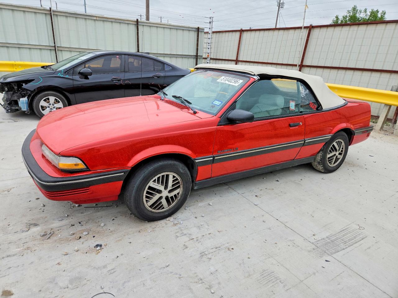 Salvage Pontiac Sunbird Image