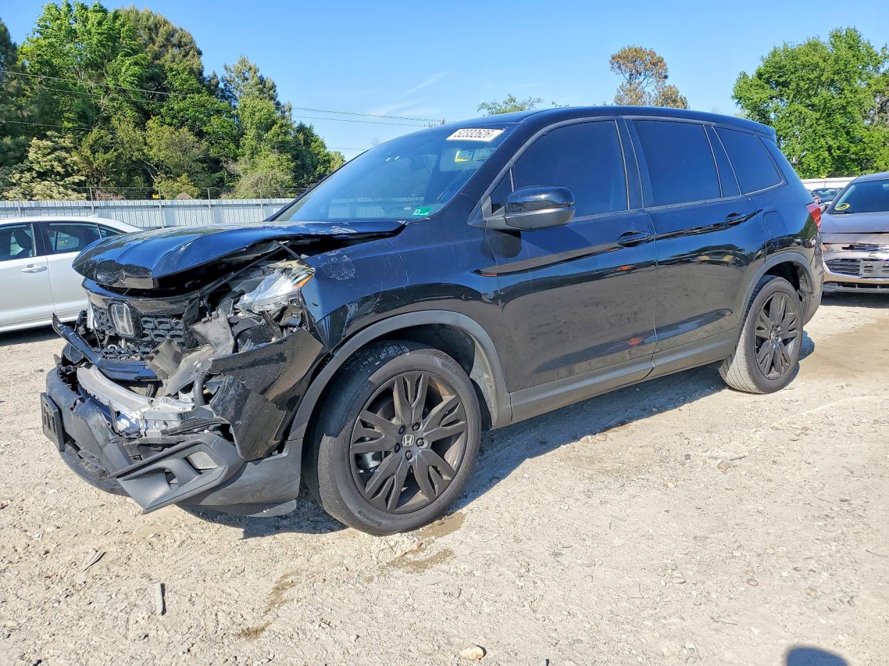 Salvage Honda Passport Image