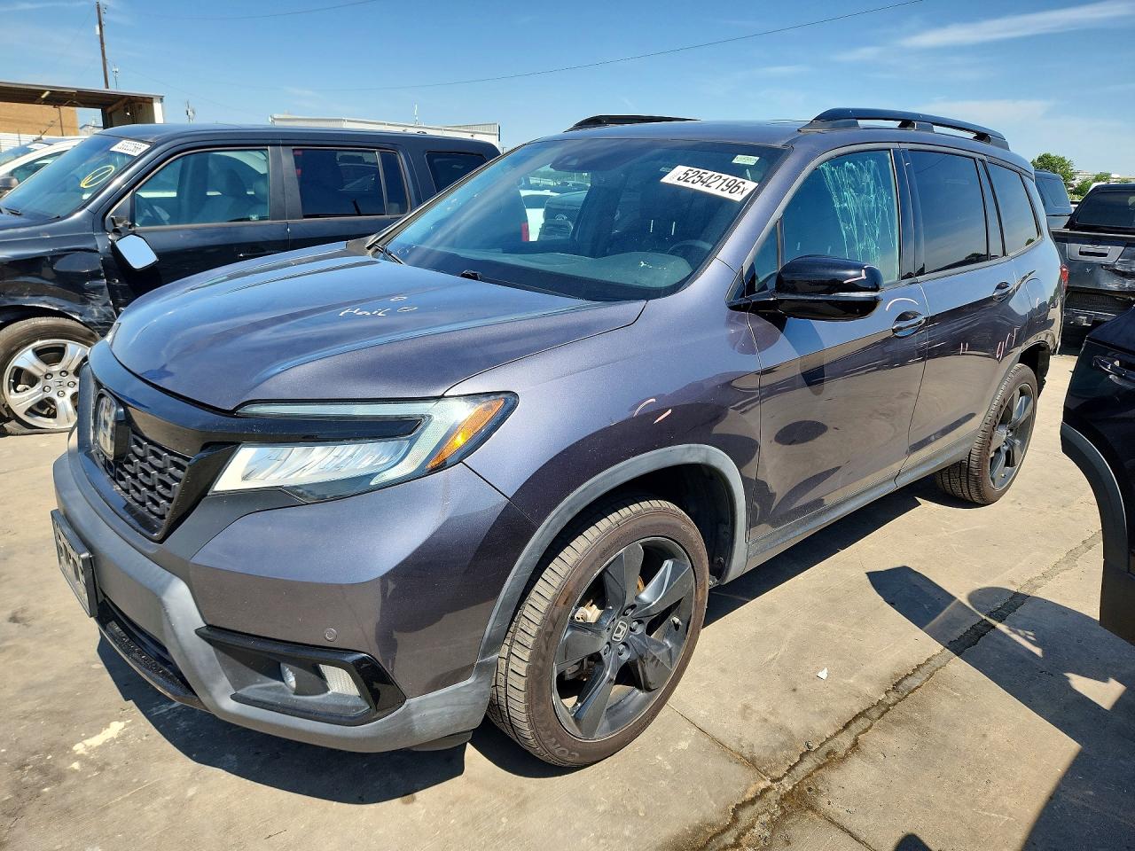 Salvage Honda Passport Image