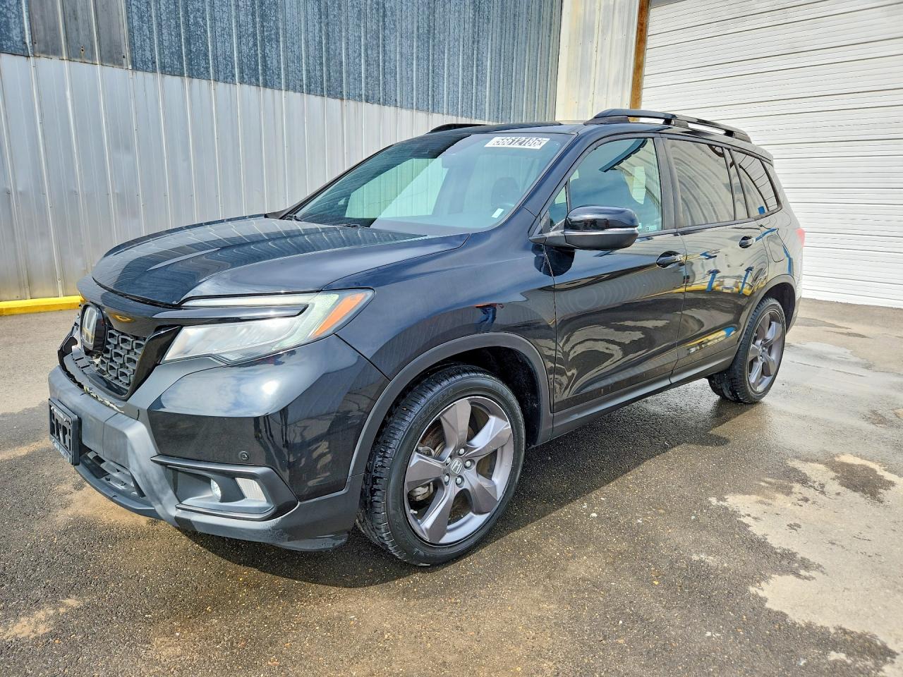Salvage Honda Passport Image