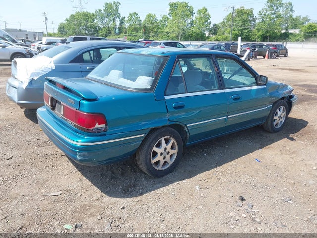 Mercury Tracer Trio