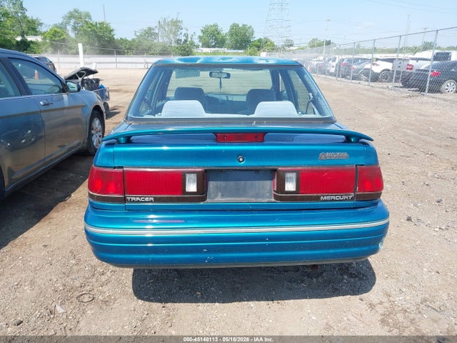 Mercury Tracer Trio