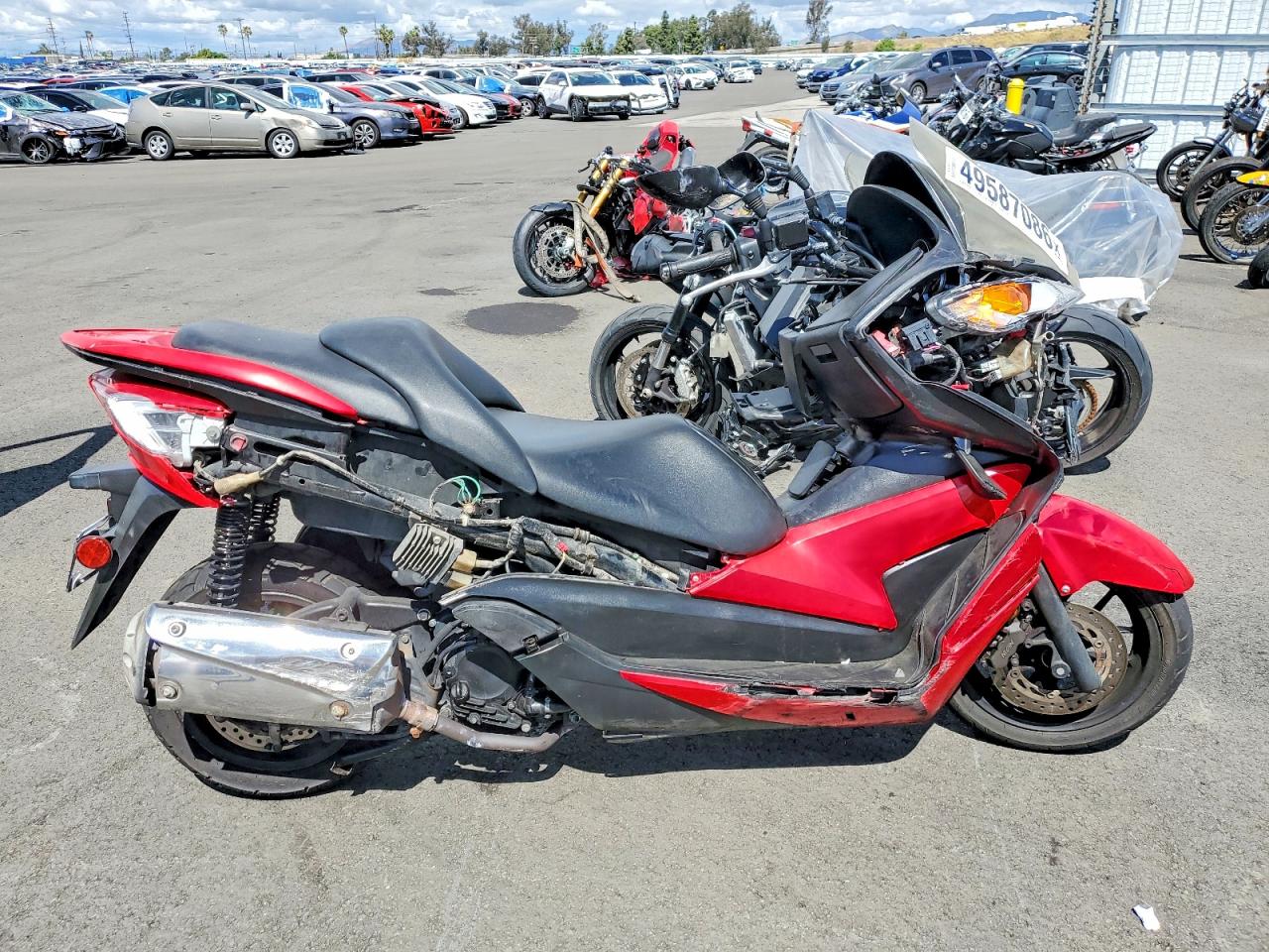 Salvage Honda Nss Cycle Image