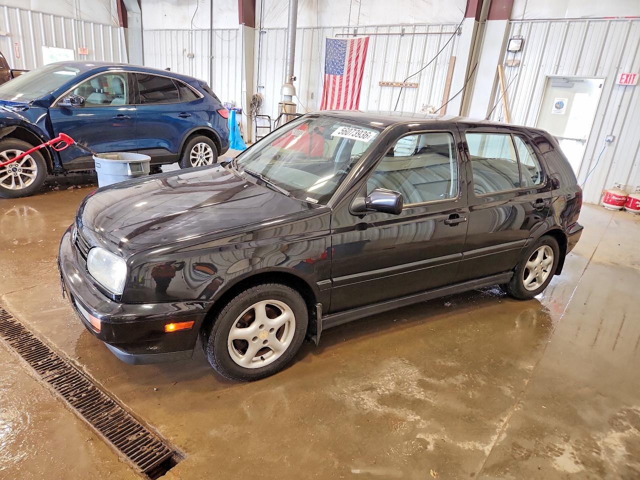 Salvage Volkswagen Golf Image
