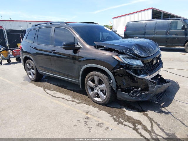 Salvage Honda Passport Image